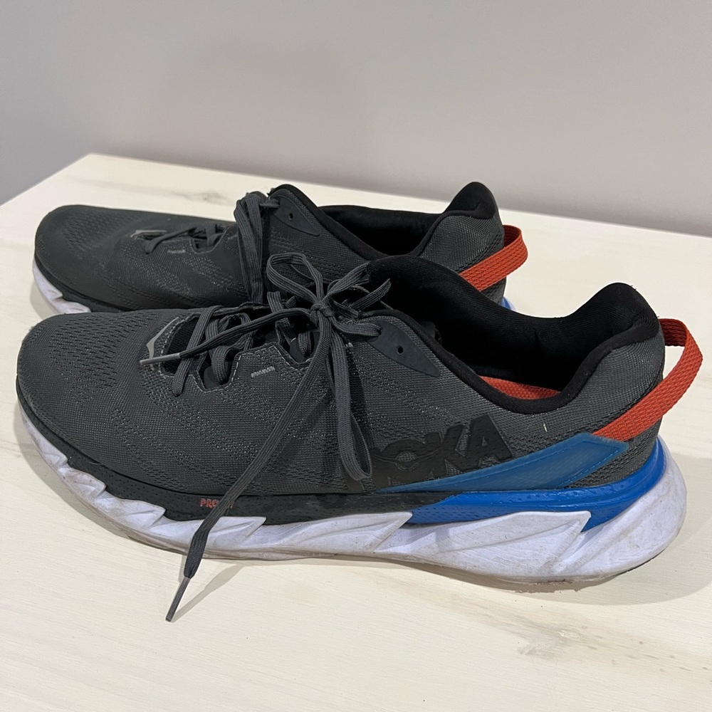 Hoka One One Men's Athletic Shoes in Black with Blue and Red Accents